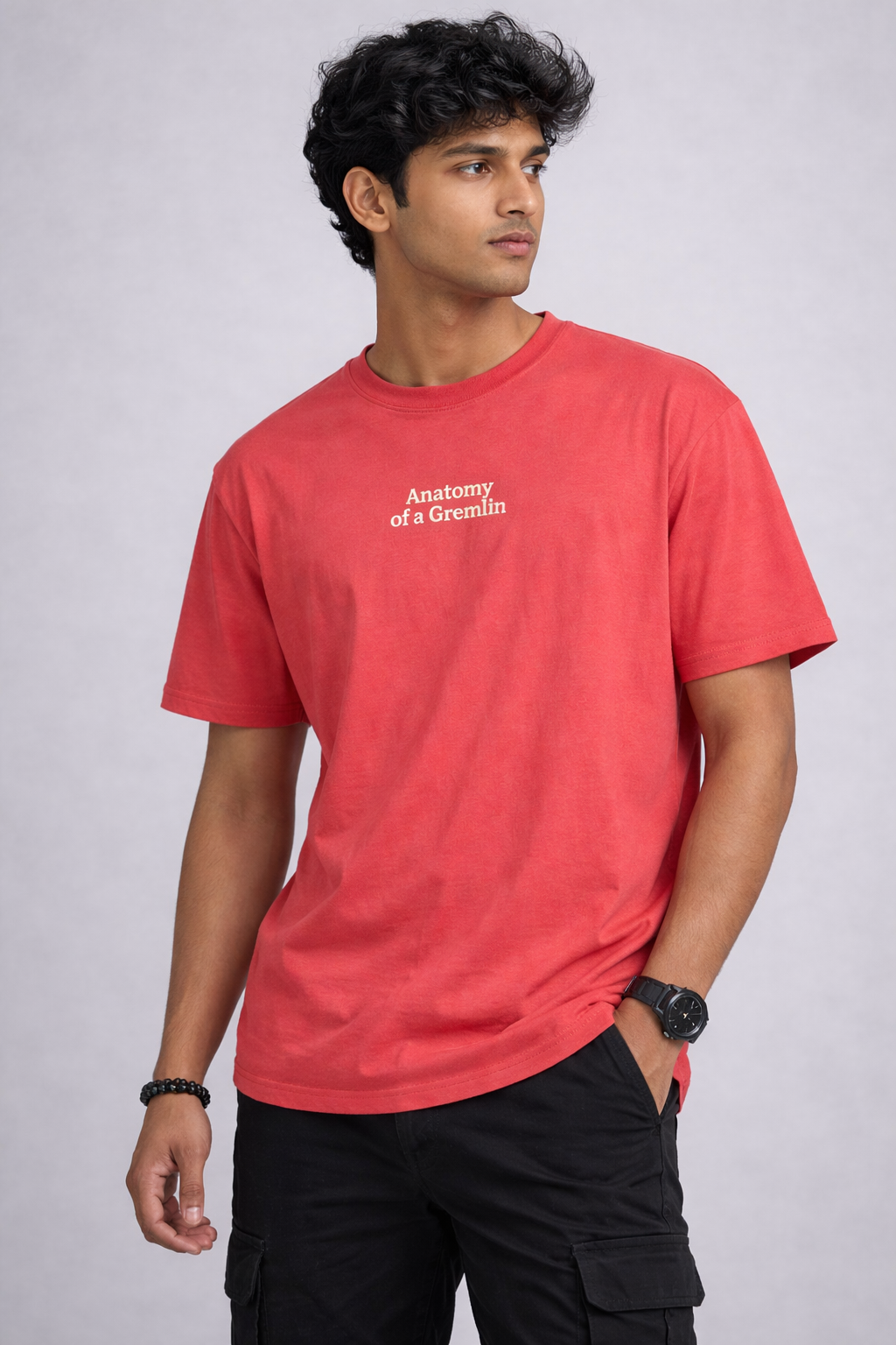 Men's red graphic t-shirt with Anatomy of a Gremlin print — front view — Kaalpanikaa