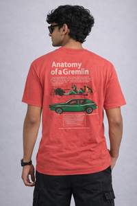 Men's red graphic t-shirt with Anatomy of a Gremlin print — back view — Kaalpanikaa